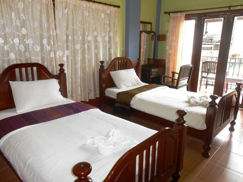 Domon Hotel Vang Vieng Ruang foto